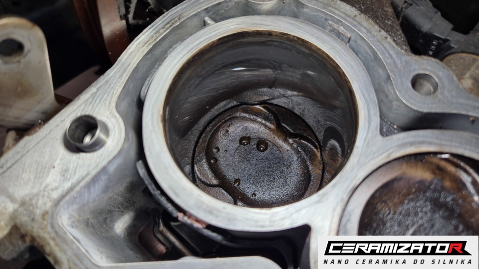 A cylinder bore and piston crown with the cylinder head removed